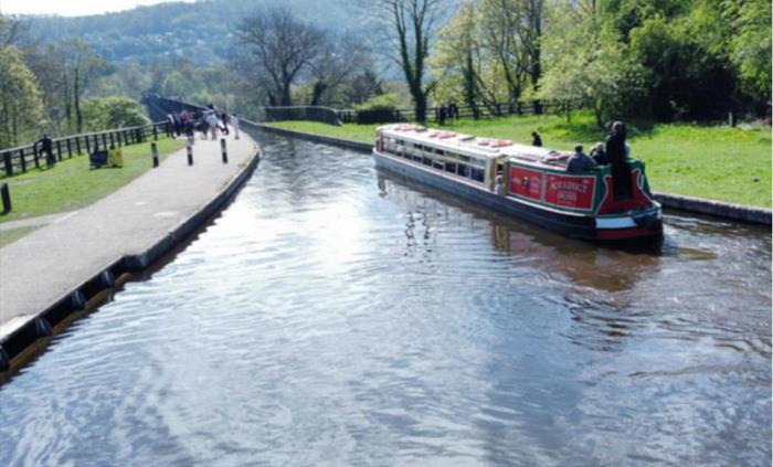 In this scene, Llangollen Wharf's Motorised Canal Boat Thomas Telford as it prepares to cross the Poncysyllte Aqueduct.